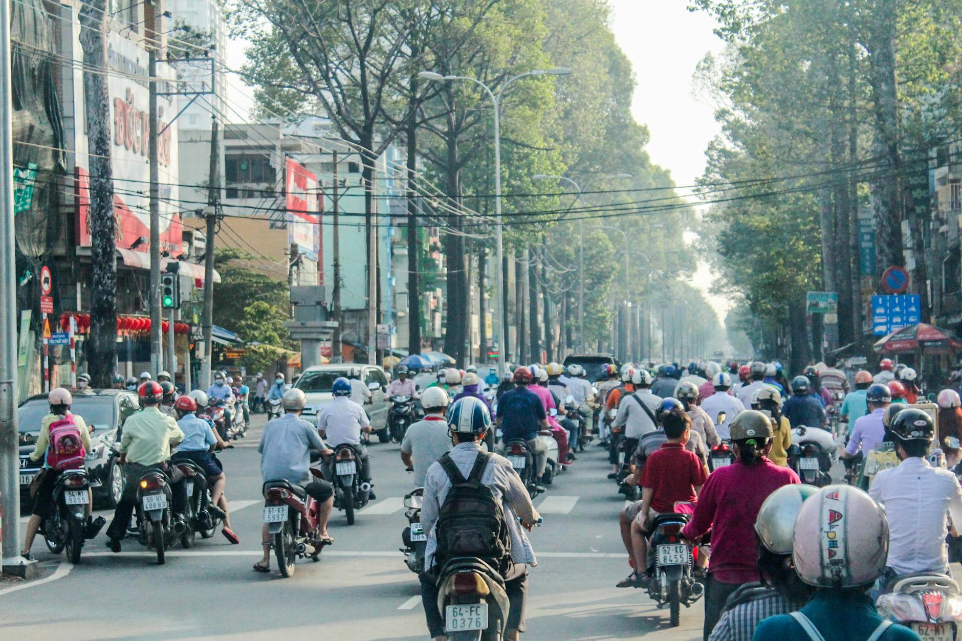people riding motorcycles on road