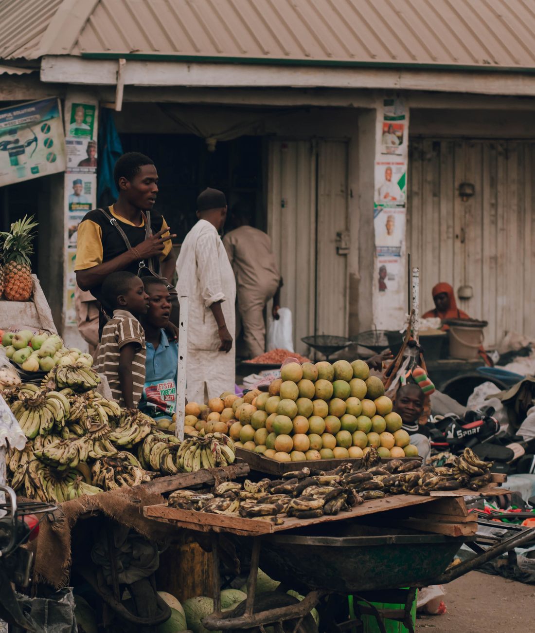 vibrant african street market with fruits and vendors